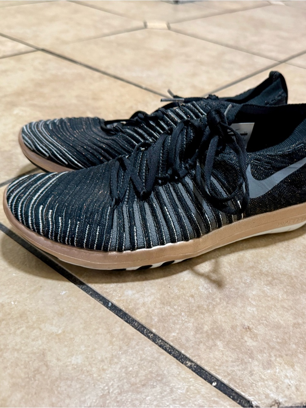 Nike Women’s Black Knit Athletic Shoes with Tan Midsole and Silver Swoosh